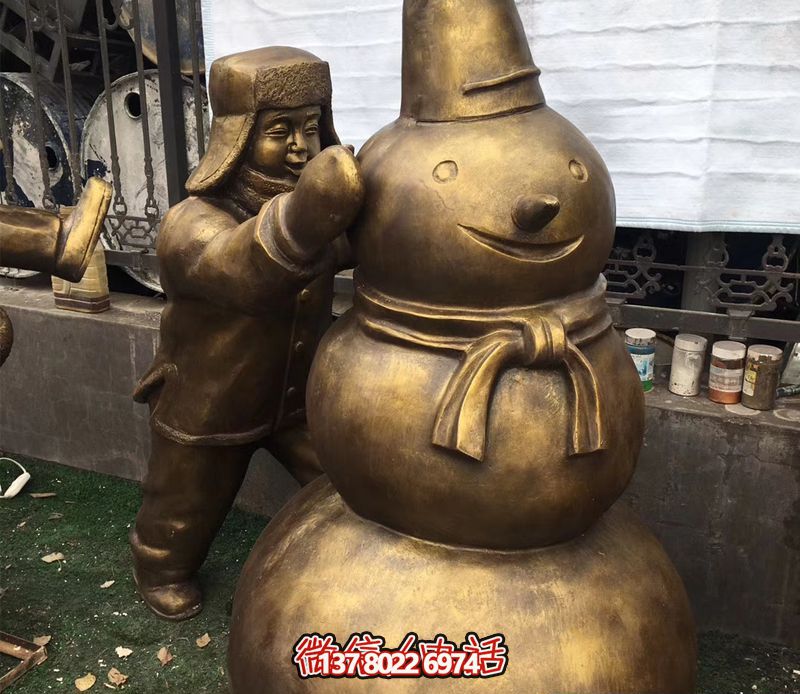 景區(qū)銅雕堆雪人兒童雕塑戴帽子