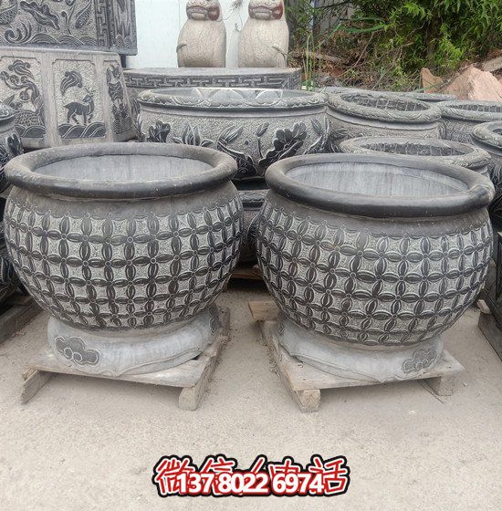 自然美學(xué)結(jié)合青石石雕、浮雕、編織、雕塑的戶外園林魚缸